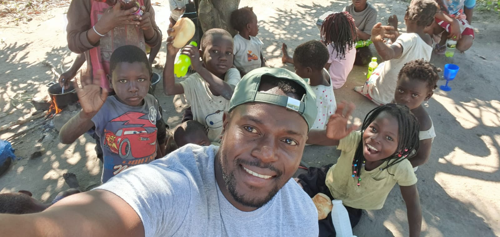 Children's Director Tony Gonondo with children during a weekly children's ministry in Mozambique